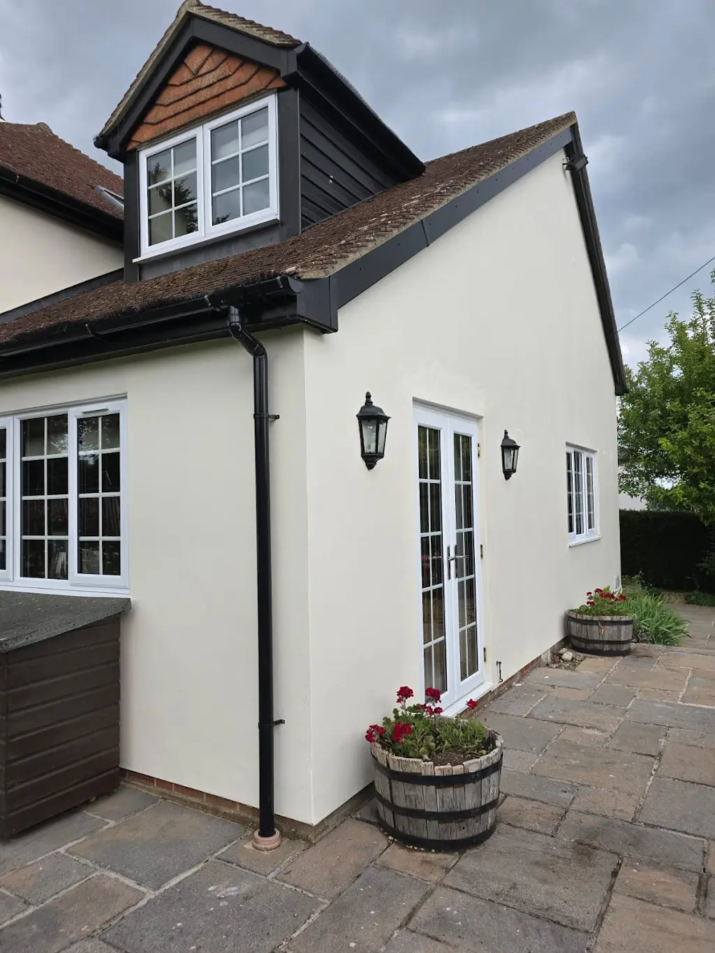 House extension exterior painting, garden view