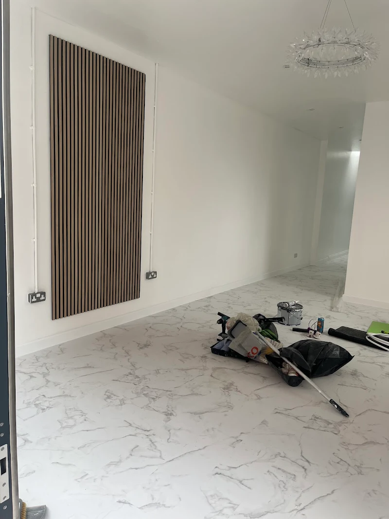Salon refurbishment - marble effect flooring and feature wall painting